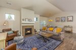 Relax in this newly furnished living space with a cozy fireplace 